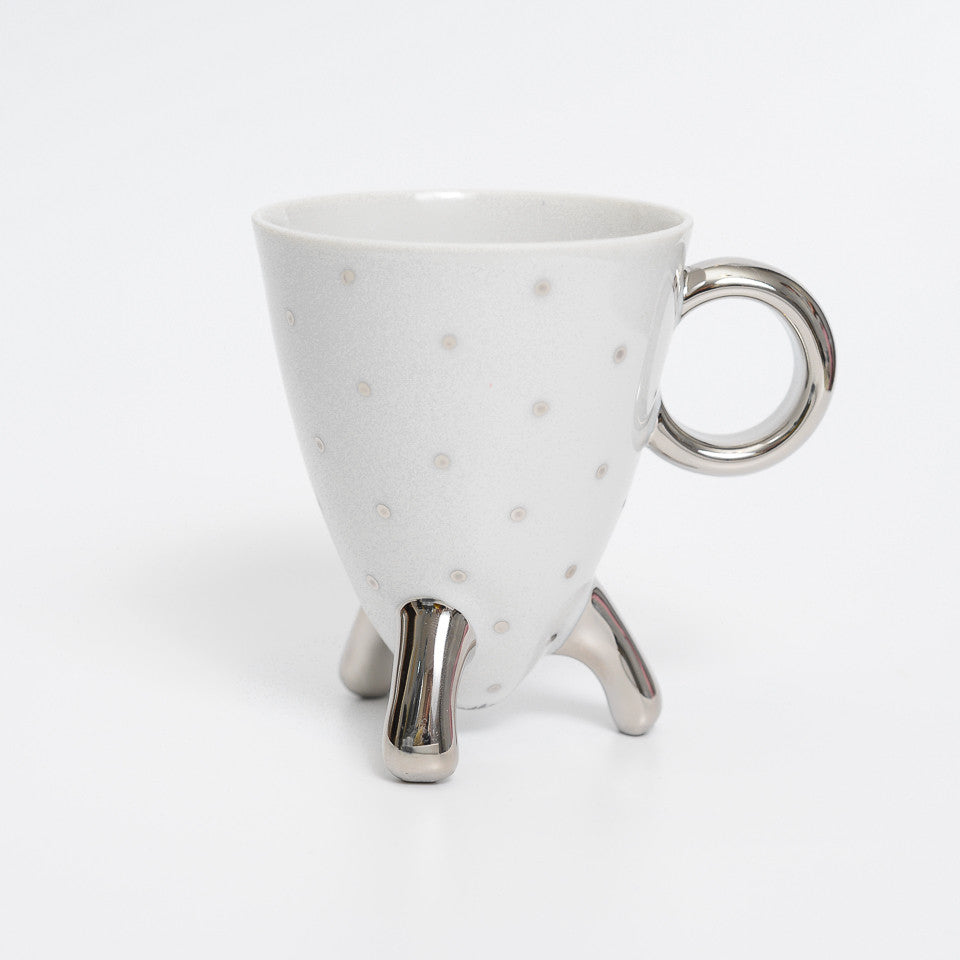 UFO - legged coffee cup with silver dots